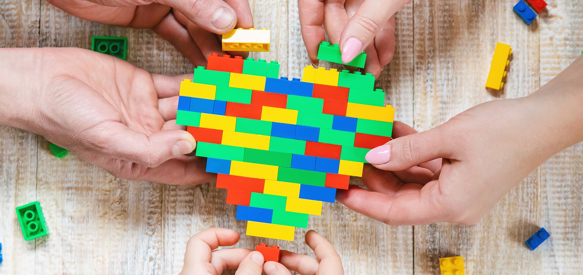 RemarkablePeople team action with social impact lego heart